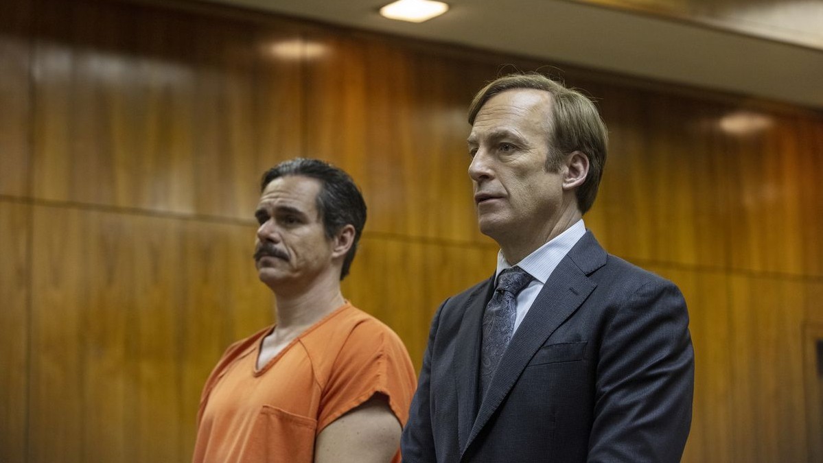 Walter White and Saul Goodman looking at each other